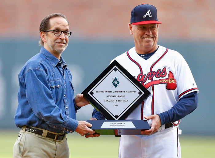 Under Snitker, who won the NL 2018 Manager of the Year award (opposite), the Braves have won three straight division titles.